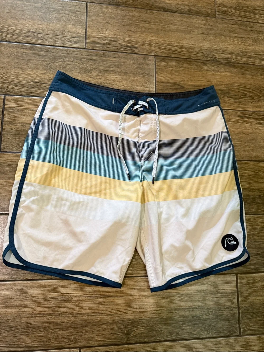 Quiksilver Men’s White Swim Shorts with Blue, Gray & Yellow Stripes